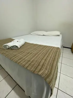 Uma cama ou camas num quarto em Center 1 Hotel