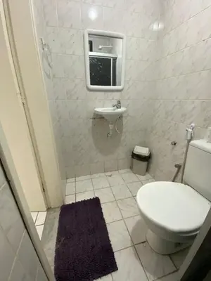 Uma casa de banho em Center 1 Hotel
