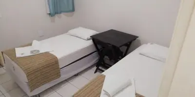 Uma cama ou camas num quarto em Center 1 Hotel