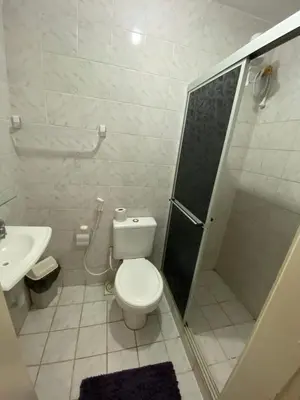 Uma casa de banho em Center 1 Hotel