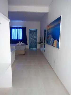 Uma cama ou camas num quarto em La Suite Praia Hotel