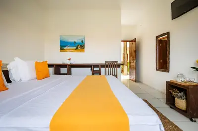 Uma cama ou camas num quarto em Hotel Maré Mansa