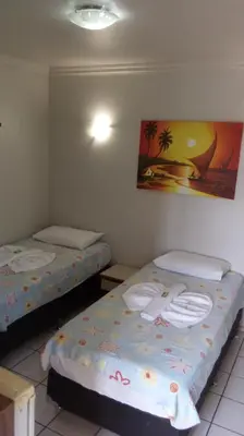 Uma cama ou camas num quarto em Pousada Mucuripe