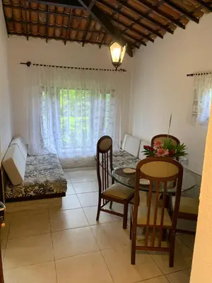 Uma área de estar em Pousada Chale Cana Brava