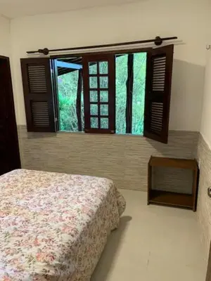 Uma cama ou camas num quarto em Pousada Chale Cana Brava