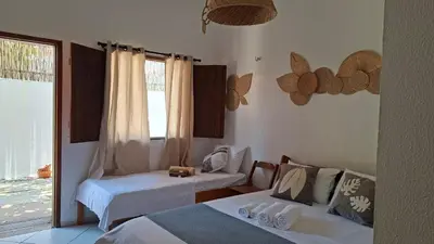 Uma cama ou camas num quarto em Pousada Kasabela Residence
