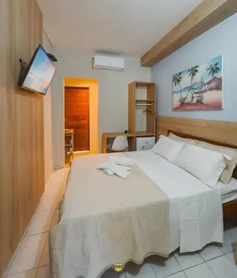 Uma cama ou camas num quarto em Pousada Melgaço