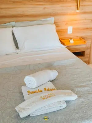 Uma cama ou camas num quarto em Pousada Melgaço