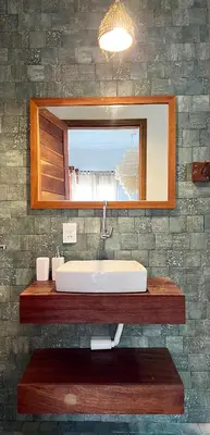 Uma casa de banho em Villa Mar Residence