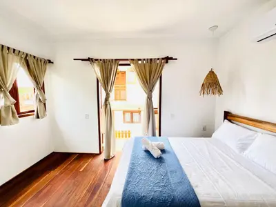 Uma cama ou camas num quarto em Villa Mar Residence