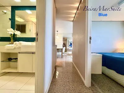 Uma cama ou camas num quarto em Beira Mar Suite