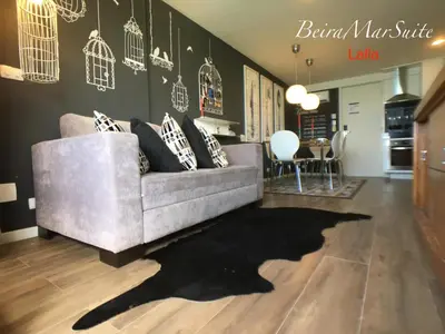 Uma área de estar em Beira Mar Suite