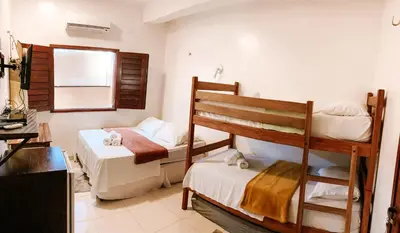 Uma cama ou camas num quarto em Vai dá Certo