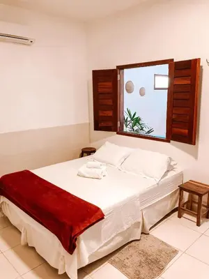 Uma cama ou camas num quarto em Vai dá Certo