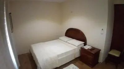 Uma cama ou camas num quarto em Ruan Beach