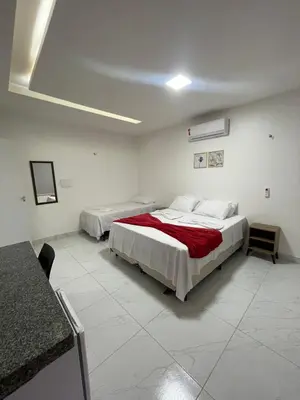 Uma cama ou camas num quarto em Pousada e Restaurante Altas Horas Beach