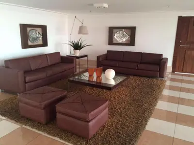 Uma área de estar em Apart Terraços do Atlântico