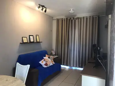 Uma área de estar em THE FOUNTAINS 110 - Apartamento em lindo condomínio pé na areia da Praia das Fontes em Beberibe - CE