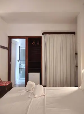 Uma cama ou camas num quarto em Hotel Sao Francisco