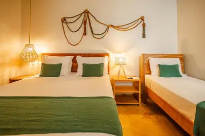 Uma cama ou camas num quarto em Pousada Preamar