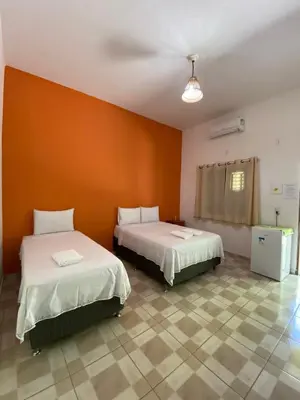 Uma cama ou camas num quarto em Pousada Trilha das Dunas