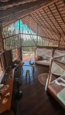 Uma cama ou camas num quarto em Villa Sabiá - Eco Bungalows