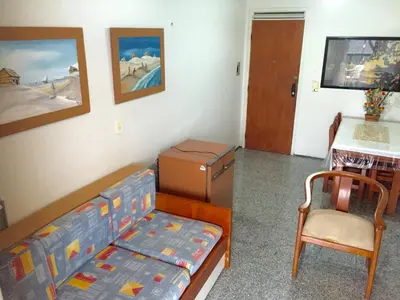 Uma área de estar em Atlântico Flat Residence