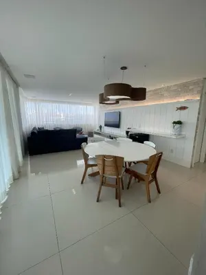 Uma televisão e/ou sistema de entretenimento em Golf Ville Resort Brisa do Golf -Apartamentos e Cobertura