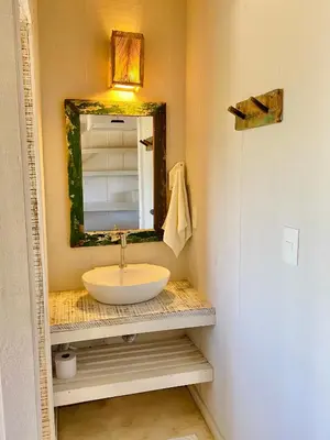 Uma casa de banho em Nordestina Casa de Mar