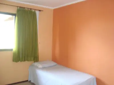 Uma cama ou camas num quarto em Pousada Vianna's