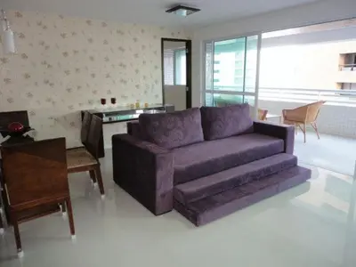 Uma área de estar em Apartamento Vista Mar 4 Suítes