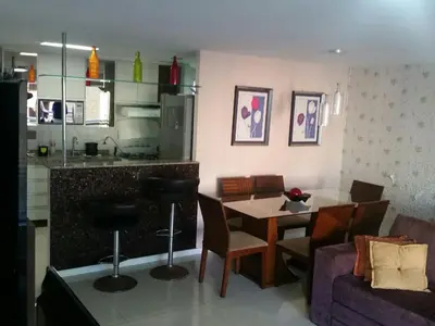 A cozinha ou kitchenette de Apartamento Vista Mar 4 Suítes