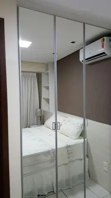 Uma cama ou camas num quarto em Beach Class Fortaleza