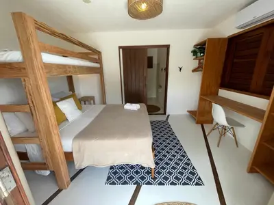 Uma cama ou camas num quarto em Villa Caribou