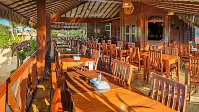 Um restaurante ou outro lugar para comer em Rede Andrade Mini