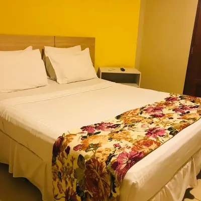 Uma cama ou camas num quarto em Hotel Pousada Latitude