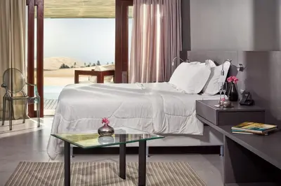 Uma cama ou camas num quarto em Essenza Dune Hotel