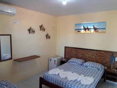Uma cama ou camas num quarto em Pousada Brisa de Flecheiras