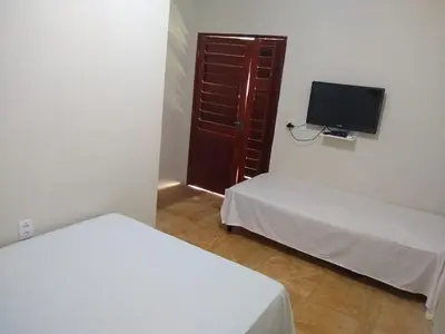 Uma cama ou camas num quarto em Beach House