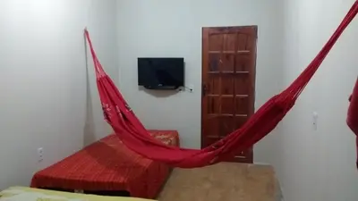 Uma televisão e/ou sistema de entretenimento em Beach House