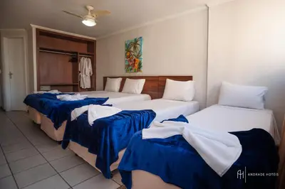 Uma cama ou camas num quarto em Rede Andrade Casa Blanca