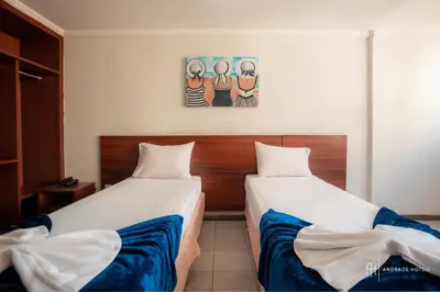 Uma cama ou camas num quarto em Rede Andrade Casa Blanca