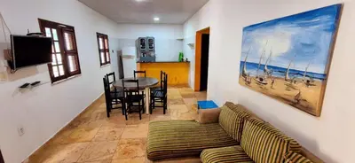 Uma área de estar em Casa no Residencia Familia