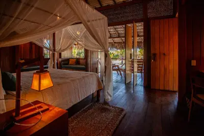 Uma cama ou camas num quarto em Jaguaribe Lodge e Kite