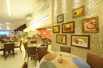 Uma área de estar em Portal Da Praia Hotel