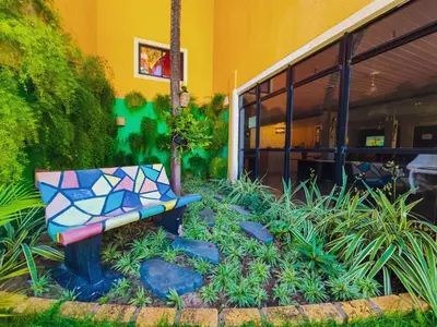 Um jardim no exterior de Pousada Brasil Cumbuco