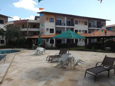 A piscina em ou perto de CONDOMÍNIO VILA DO MAR aptos 201C e 211B