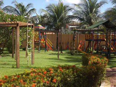 A área de jogos para crianças em CONDOMÍNIO VILA DO MAR aptos 201C e 211B