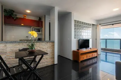 Uma televisão e/ou sistema de entretenimento em Particular Iracema Residence
