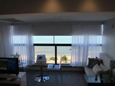 Uma televisão e/ou sistema de entretenimento em Particular Iracema Residence